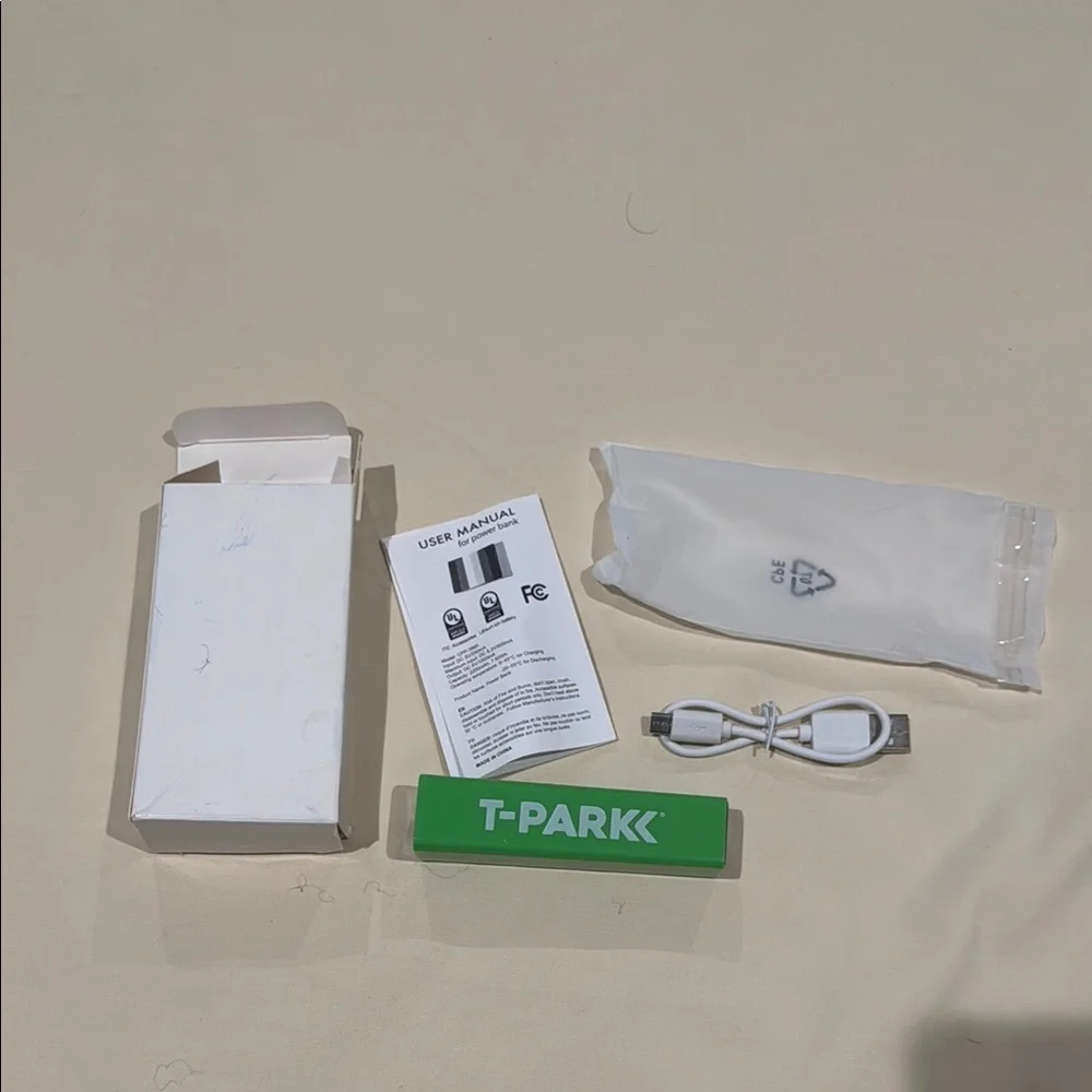 Green and White Charger with Portable Battery Pack for Cell Phones